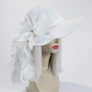 The ‘Vixen and Fox’ Hat handcrafted feather with bohemian beads on suede cord.